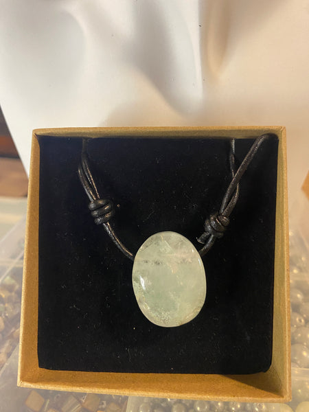 Clear Quartz with inclusions leather necklace.