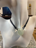 Clear Quartz with inclusions leather necklace.