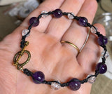 Handmade Amethyst & Clear Quartz macrame bracelet.